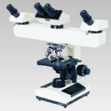 Drei Leute, die biologisches Mikroskop Xsz-N304 mit S-LED Beleuchtung betrachten